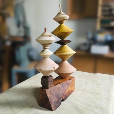 Art i(s) fact, Wood is Fiction: Turning and Stacking Stories